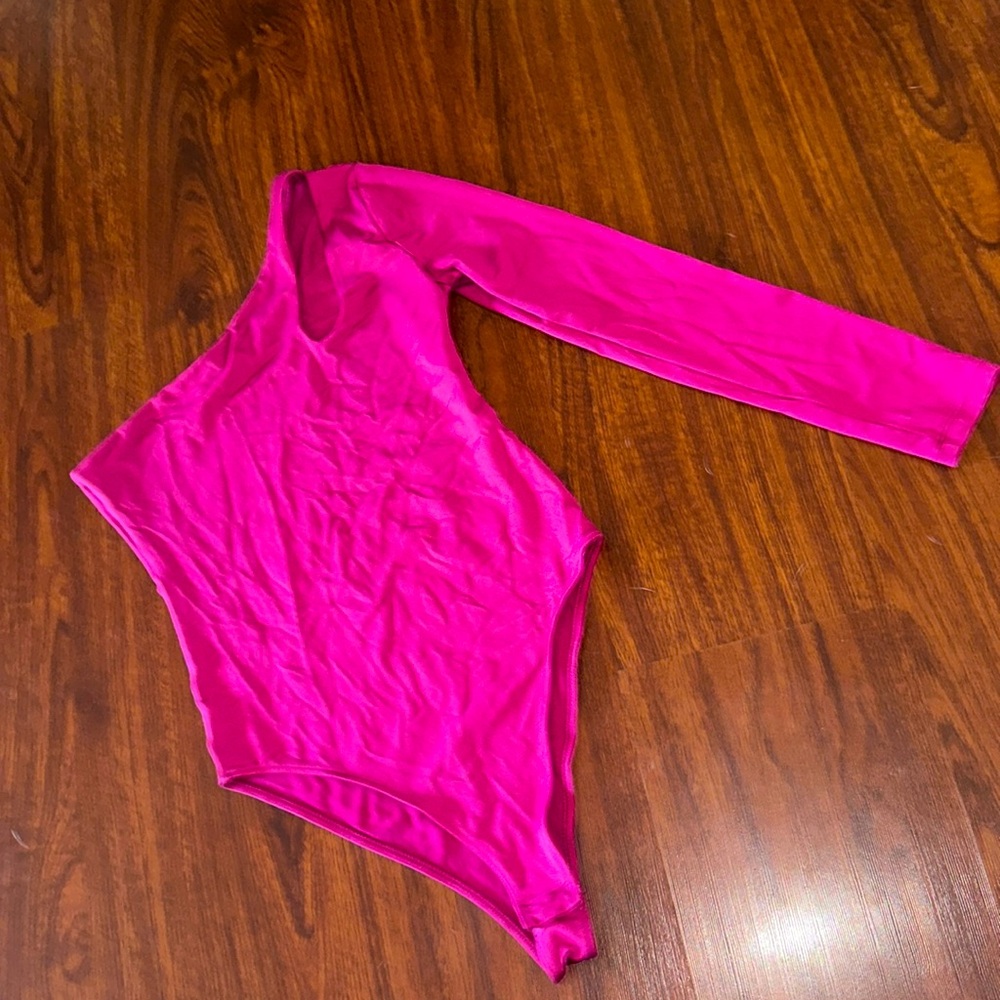 Spandex one sleeve bodysuit with cool, cut out and snap crotch size medium